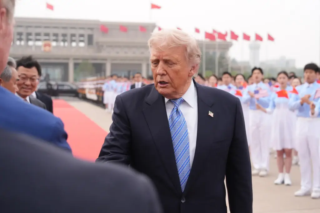 President Donald Trump walks to board Air Force One.