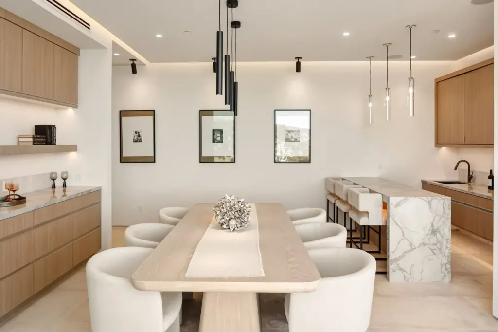 The formal dining space and wet bar. (Courtesy of The...