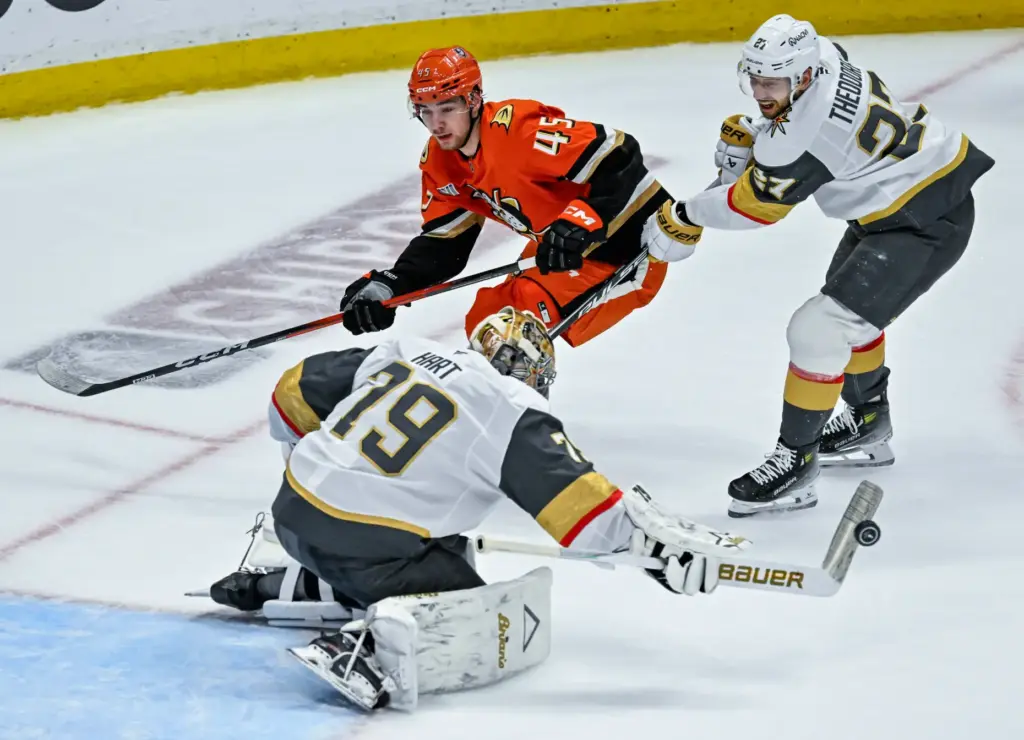 The Golden Knights goalie Carter Hart (79) blocks a shot...