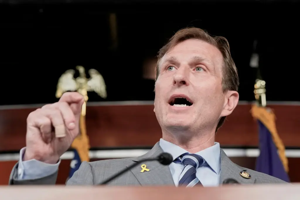 FILE – Rep. Dan Goldman, D-N.Y., speaks during a news...