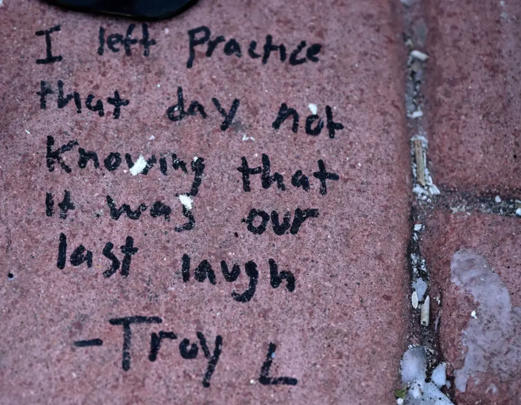 Heart-felt messages are left at the crash site where a...