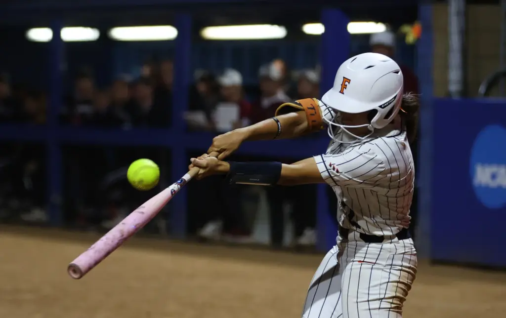 Cal State Fullertonâs Sarah Perez swings at a pitch during...