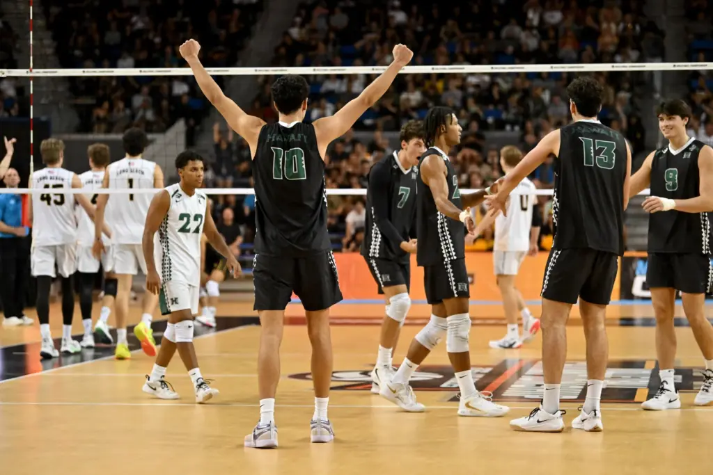 Hawaii players celebrate their win against Long Beach State in...
