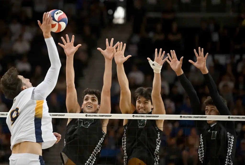 UC Irvineâs Andrej Jokanovic, left, tries to hit through a...