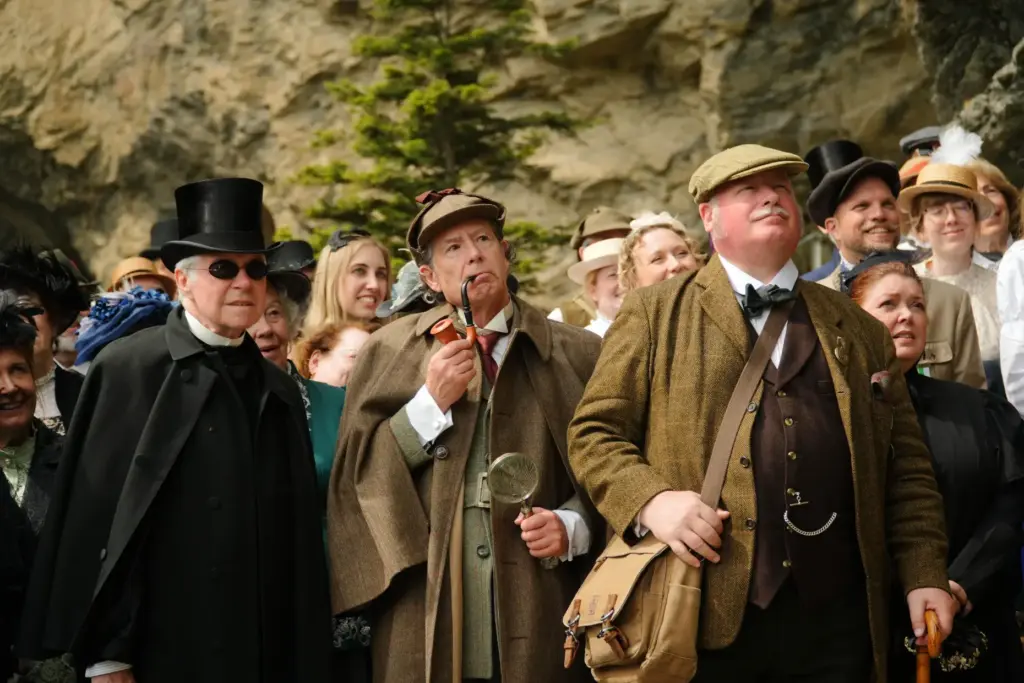 Peter Horrocks, as Professor Moriarty; Philip Porter as Sherlock Holmes; and Charles Miller, as Doctor Watson.