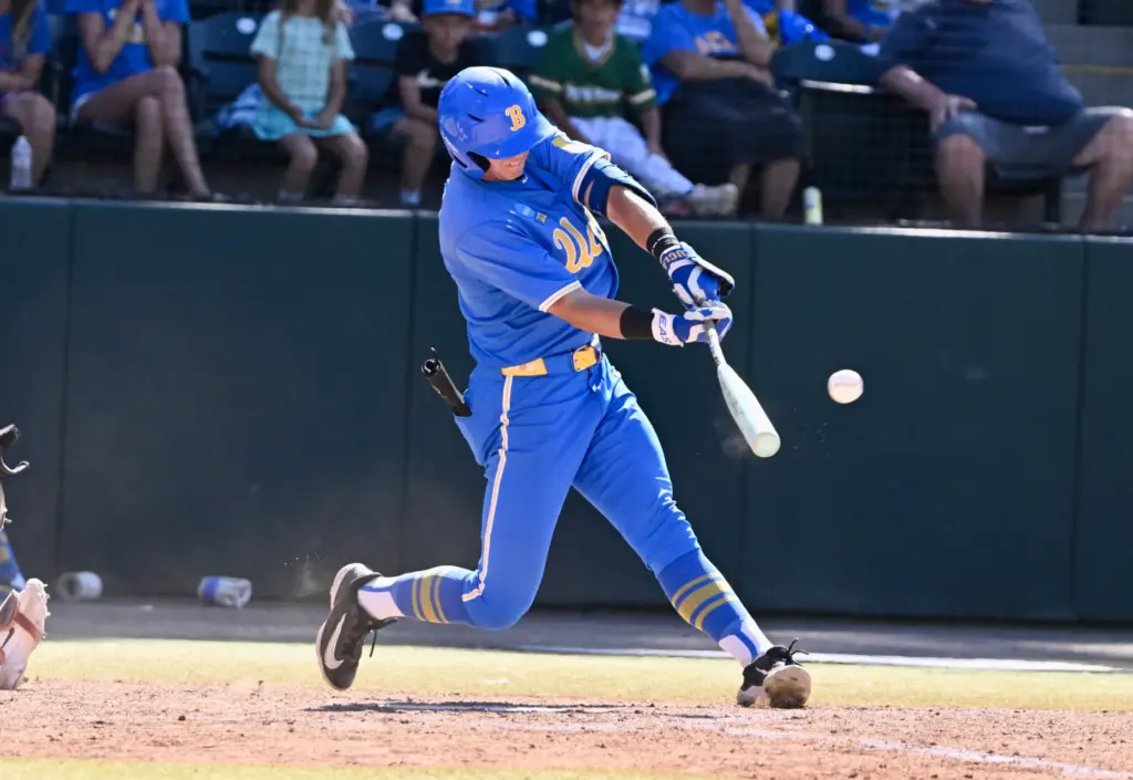Roman Martin #7 of the UCLA Bruins hits a game...