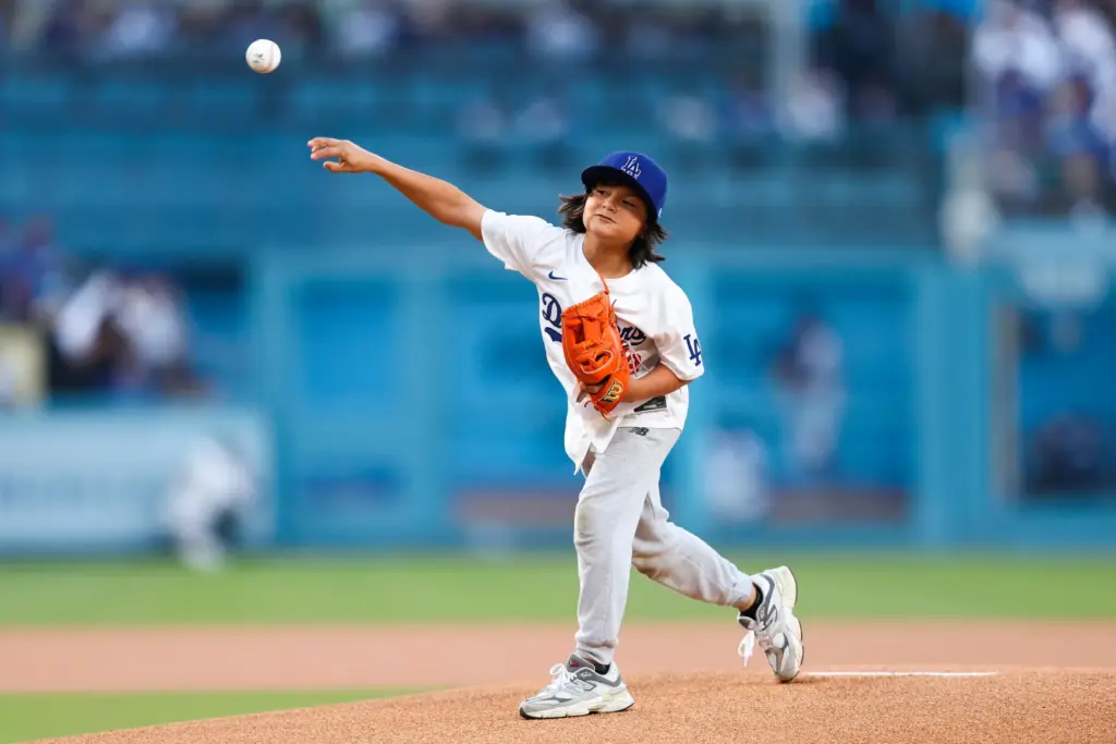 Aaron Rojas, the son of Dodgers infielder Miguel Rojas, throws...