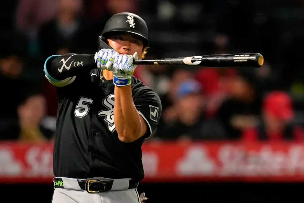Chicago White Sox slugger Munetaka Murakami takes a warm-up swing...