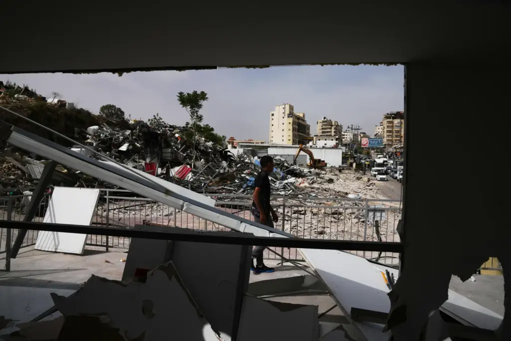 A man inspects the site of an Israeli army demolition campaign