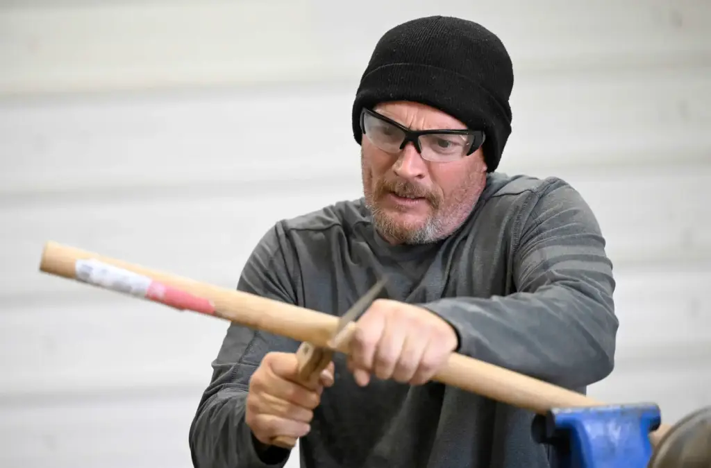 âRancherâ David Matthies, 50, of Apple Valley, repairs a pitch...