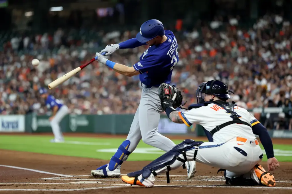 The Dodgers’ Kyle Tucker hits an RBI single during the...