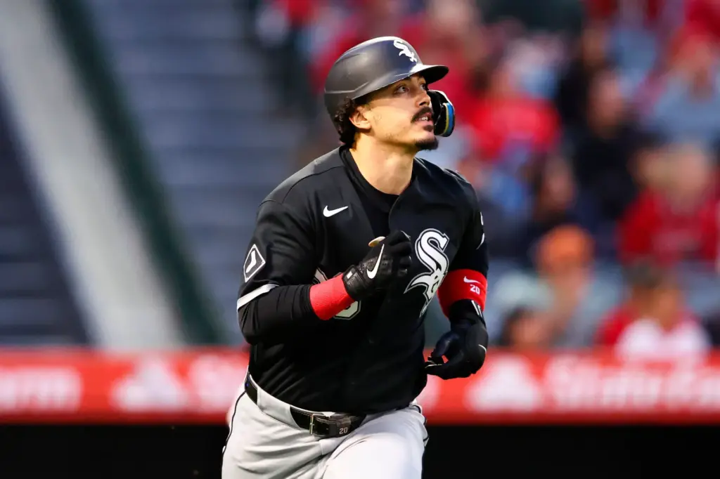 The Chicago White Sox’s Miguel Vargas watches the flight of...