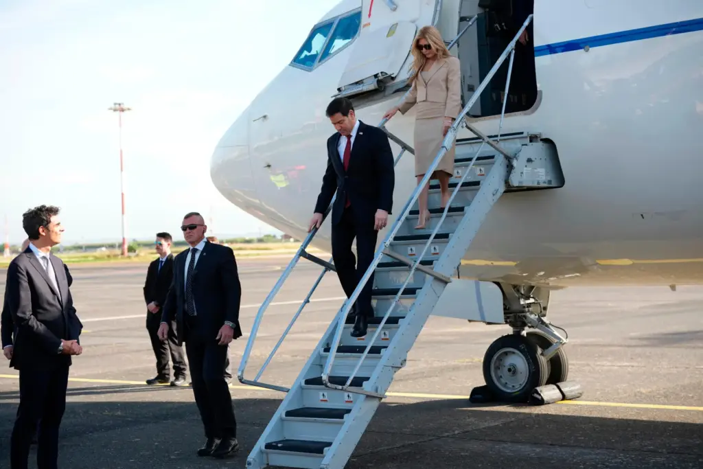 Secretary of State Marco Rubio and his wife, Jeannette, arrive at Rome's Ciampino airport.