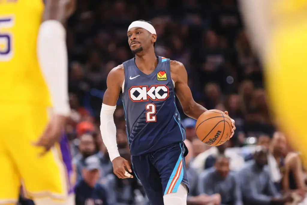 Oklahoma City Thunder’s Shai Gilgeous-Alexander advances the ball upcourt against...