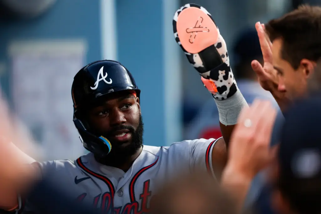 The Atlanta Braves’ Michael Harris II celebrates with teammates in...