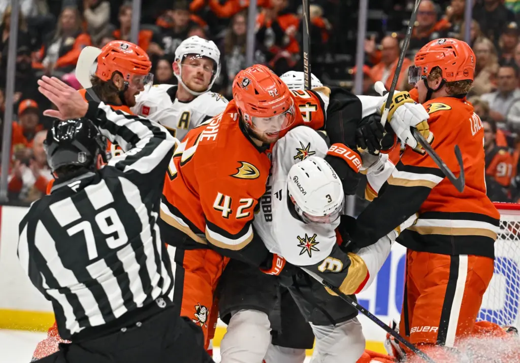 The Ducksâ Tim Washe (42) and Vegas Golden Knightsâ Brayden...