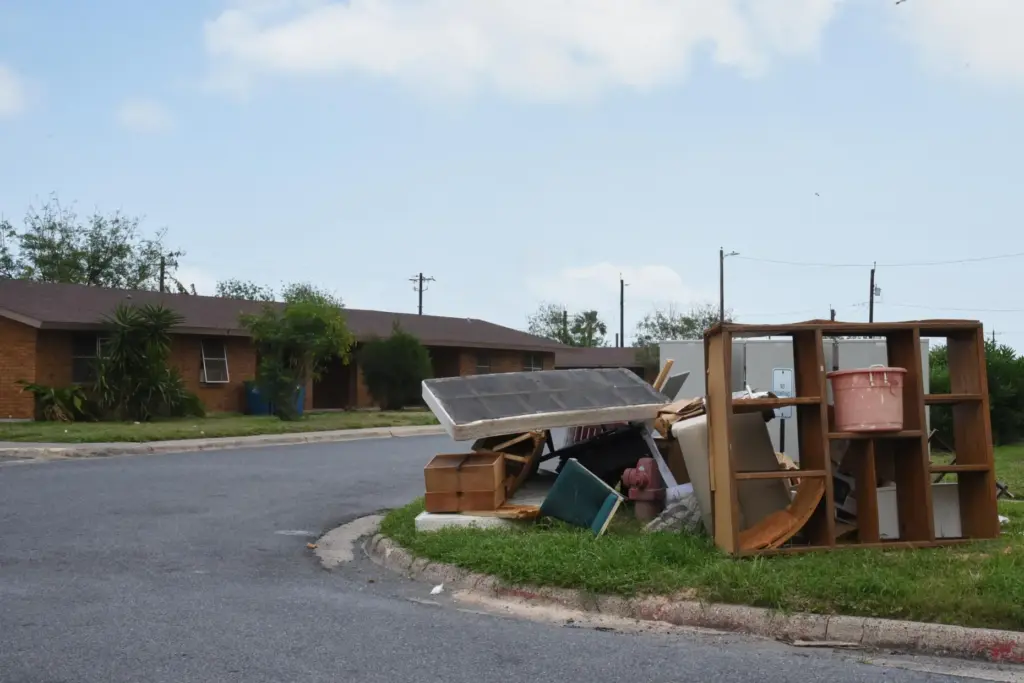 A pile of furniture is seen in a public housing subdivision in Port Isabel, Texas.