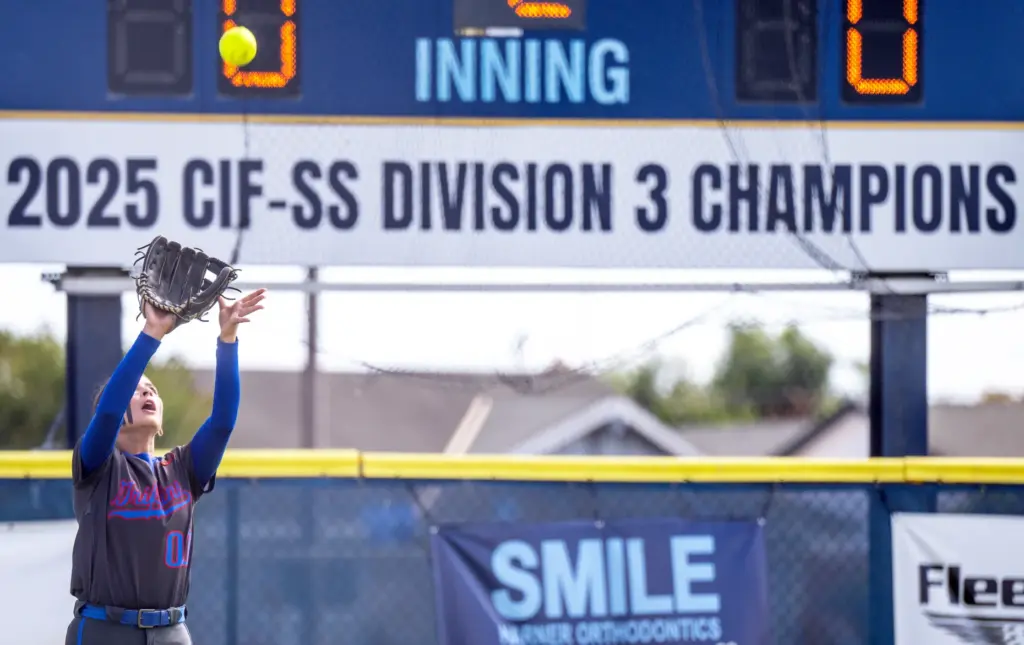 Los Alamitos left fielder Ryann Velazquez makes a catch during...