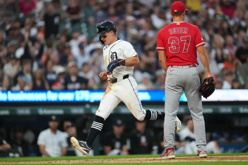 The Detroit Tigers’ Kevin McGonigle scores on a passed ball...
