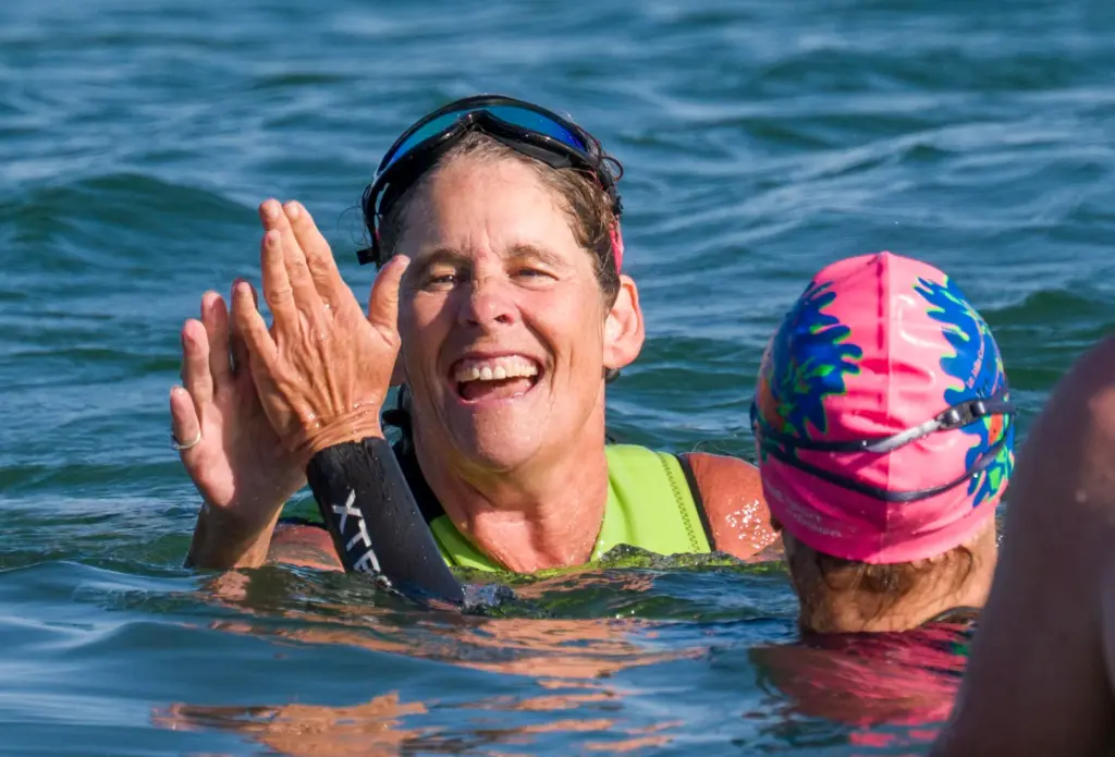 Maria Korcsmaros, left, gets a high-five from Val Bath after...