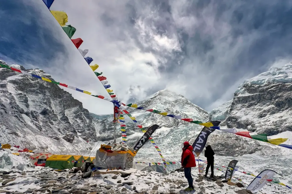 Prayer flags furl over the guides' and mountaineers' tents at the base camp of Mount Everest.