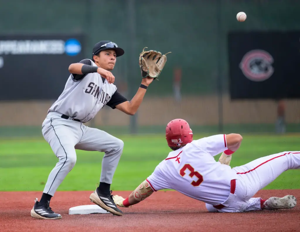 Santiago shortstop Jayden Ramirez waits for the late throw as...