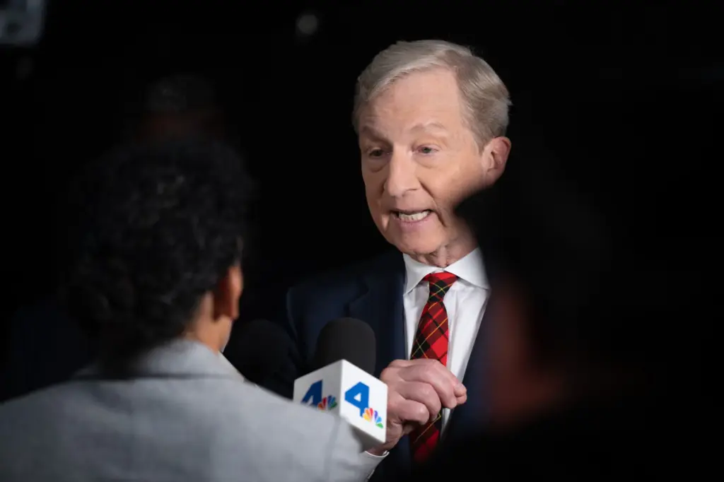 Gubernatorial candidate Tom Steyer talks with media after a debate...