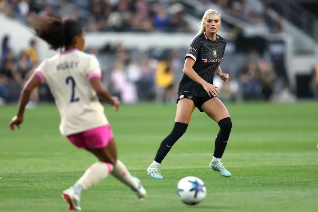 Angel City FC forward Riley Tiernan, right, defends against San...