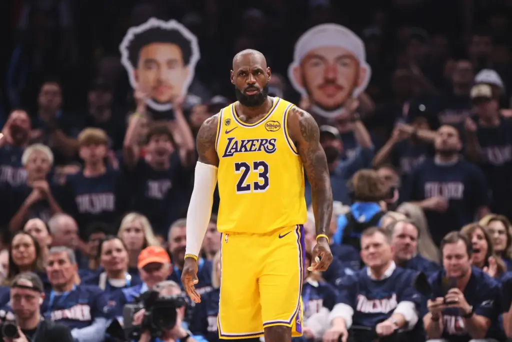 Los Angeles Lakers forward LeBron James stands on the court...