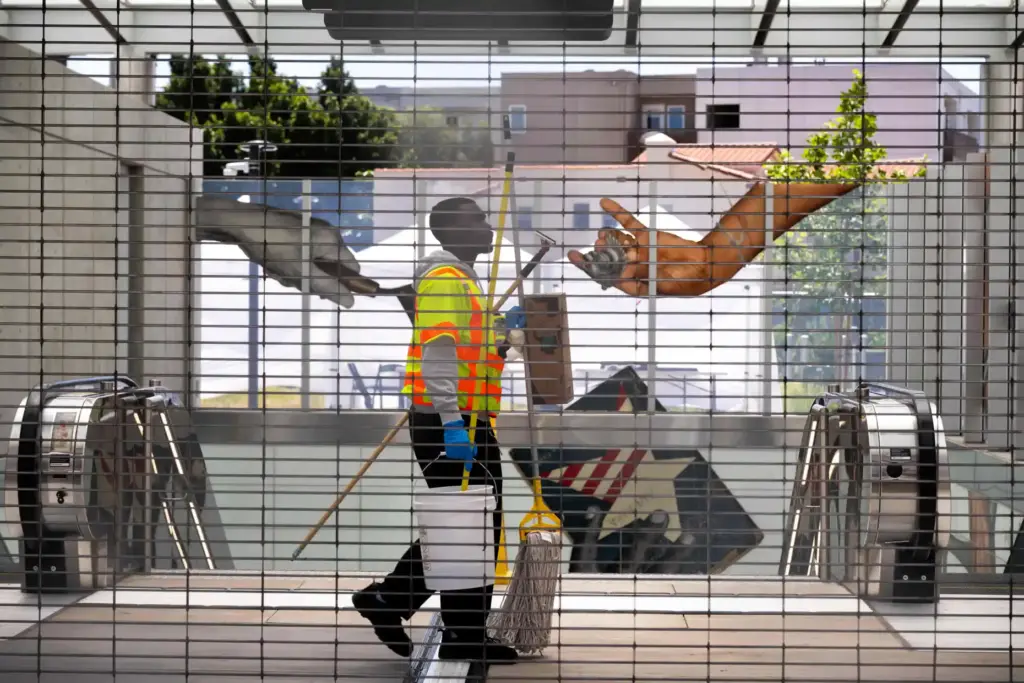A janitor cleans the Metro D Line Subway Extensionâs Wilshire/Fairfax...