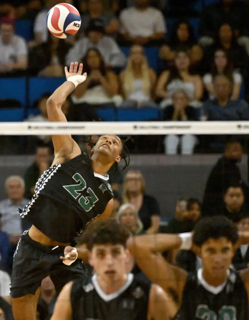 Hawaiiâs Louis Sakanoko serves the ball during the NCAA men’s...