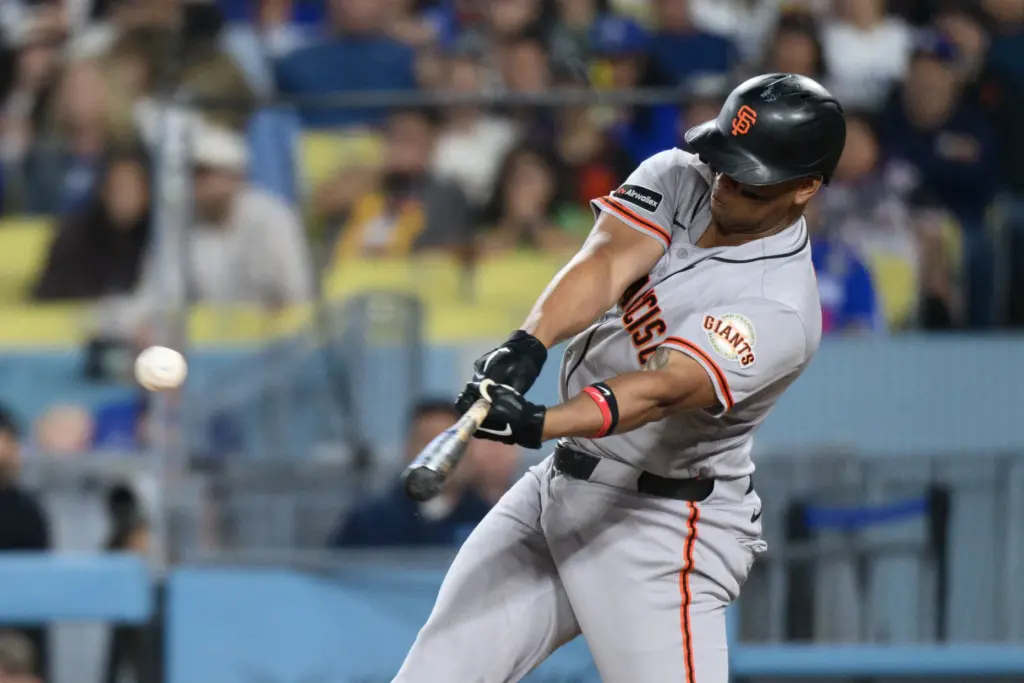 The San Francisco Giants’ Rafael Devers hits a single during...