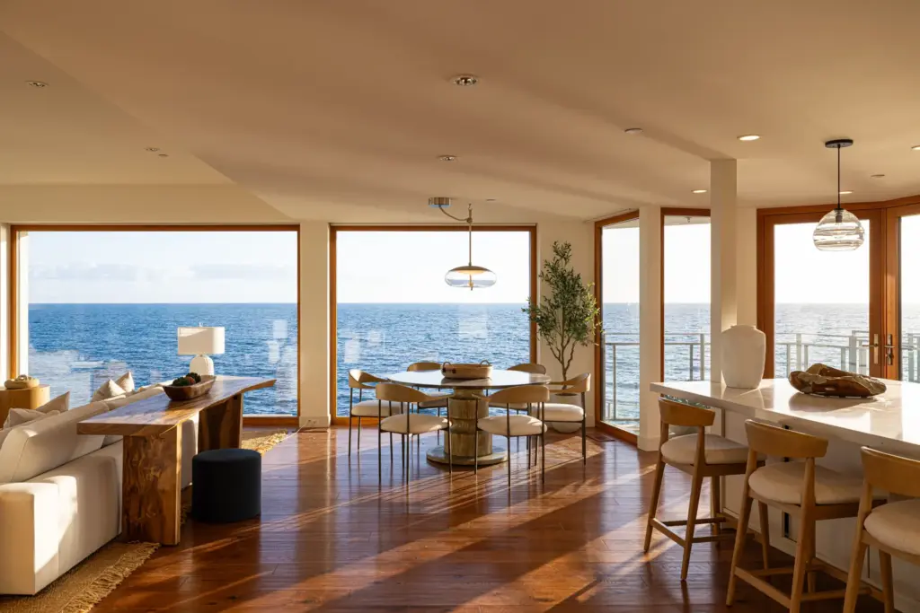 The great room flows into the kitchen, formal dining area...