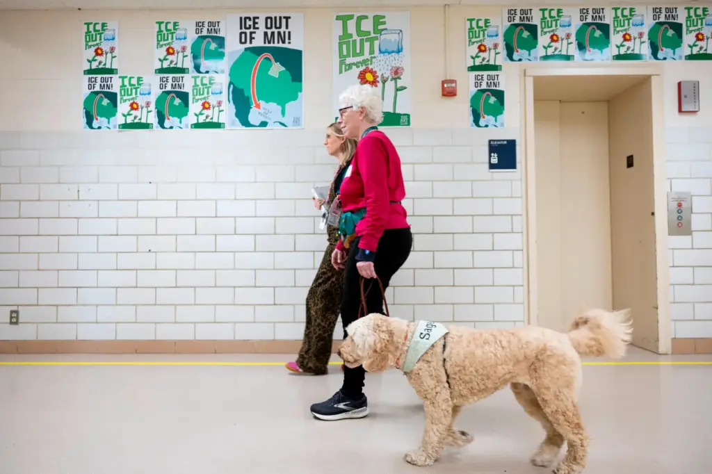School social worker Nicole Herje walks through the hallway at...