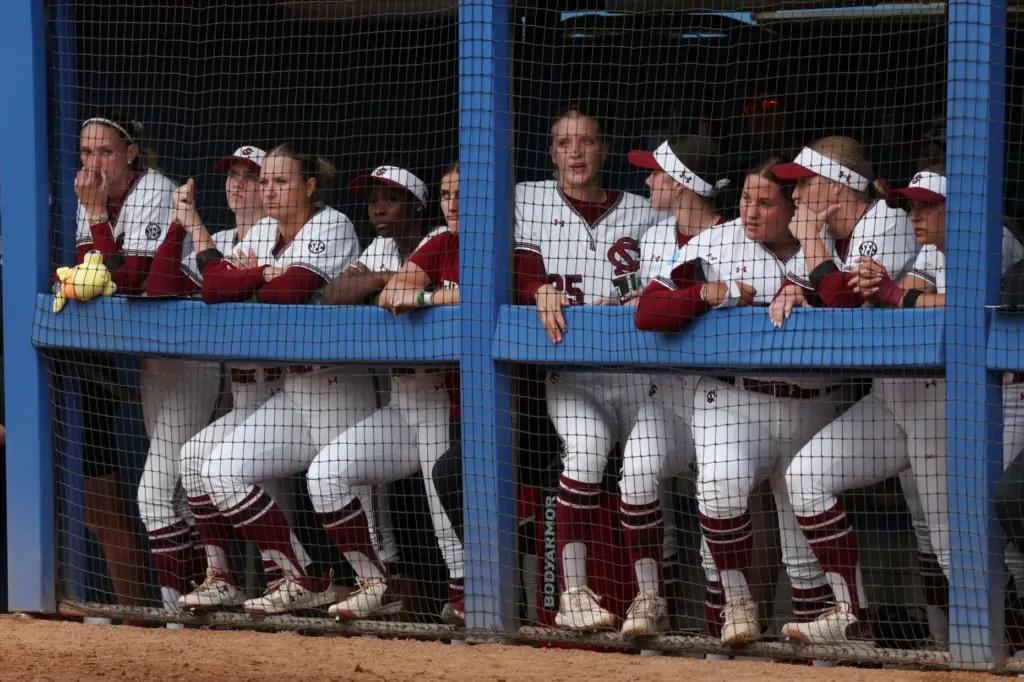 South Carolinaâs dugout watches as their teams falls deeper in...