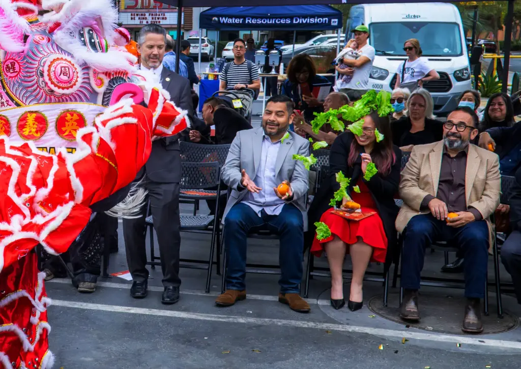 Members of the Santa Ana City Council are showered with...