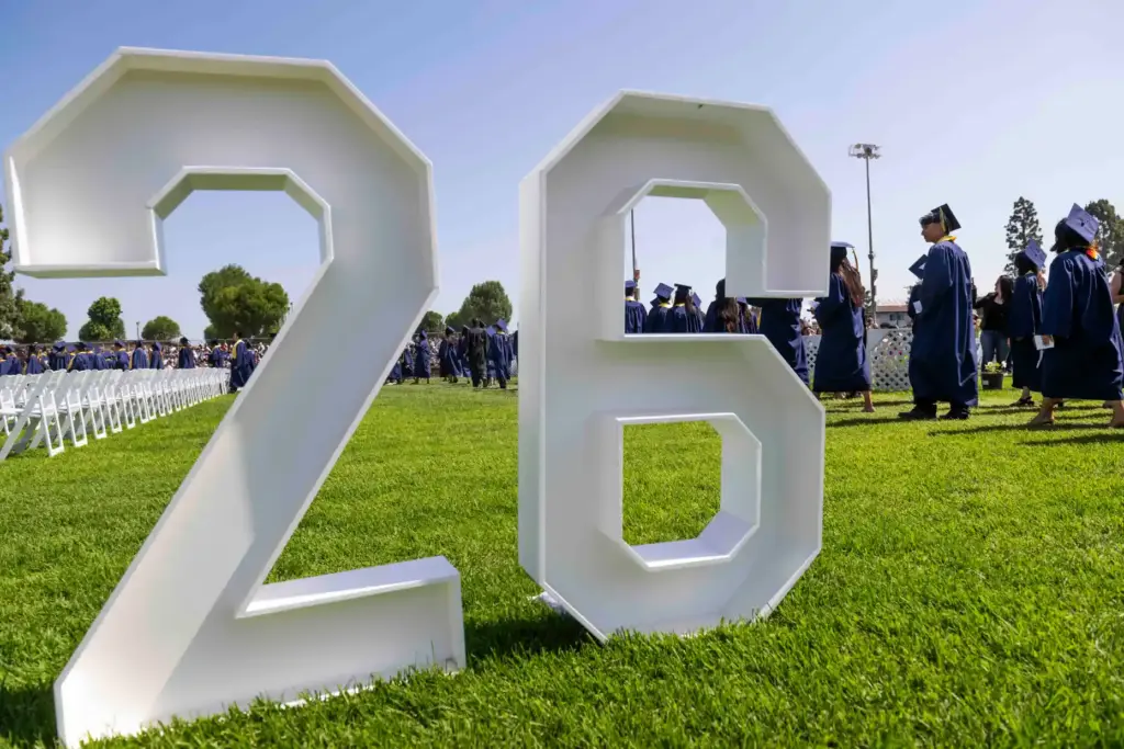 Graduates enter Handel Stadium at the start of the Anaheim...