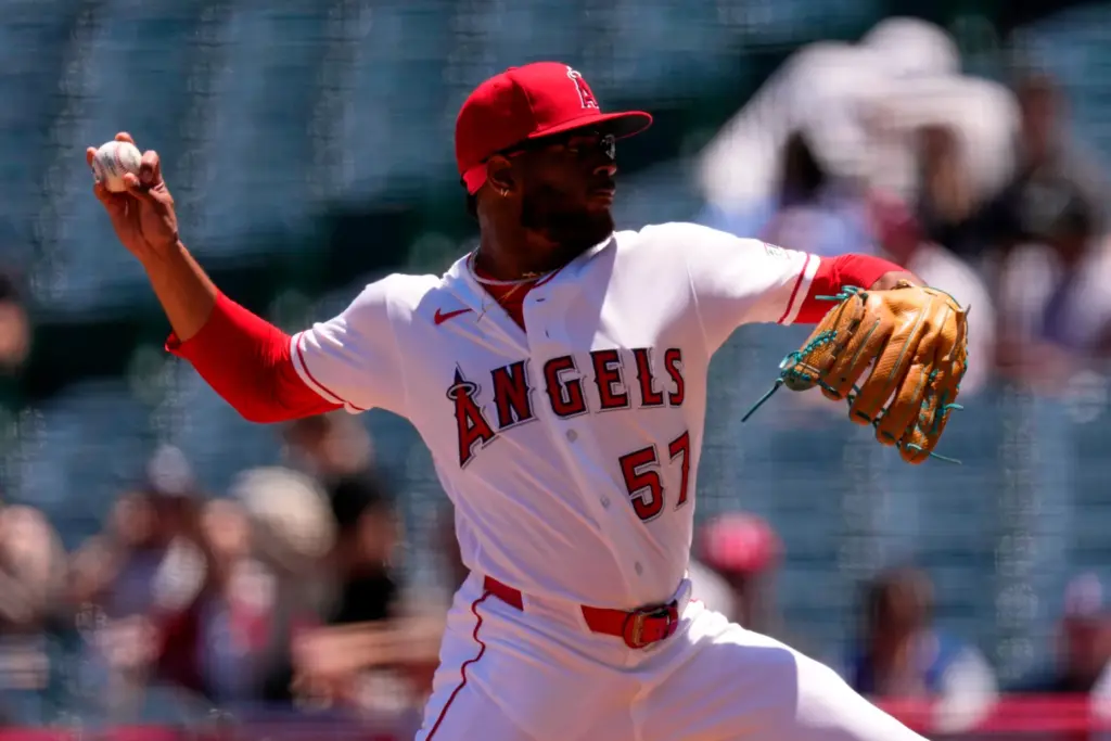 Angels starting pitcher Walbert UreÃ±a throws to the plate during...