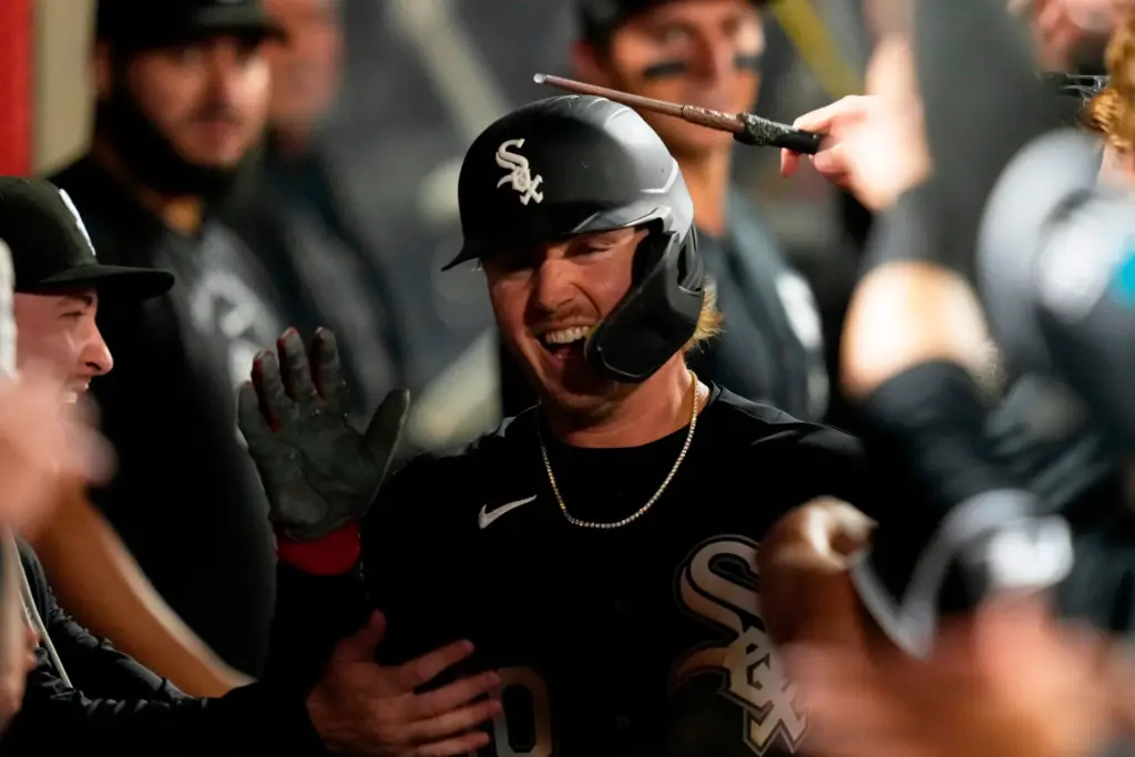 The Chicago White Sox’s Chase Meidroth is congratulated by teammates...