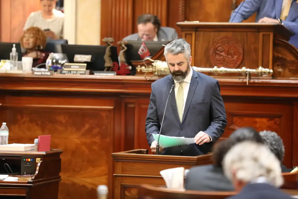 Republican South Carolina Rep. Micah Caskey reads a resolution