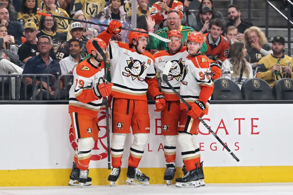 The Ducks’ Leo Carlsson (91) celebrates with Troy Terry (19),...