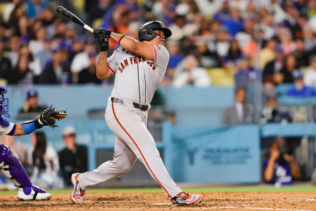 The San Francisco Giants’ Rafael Devers hits a single during...