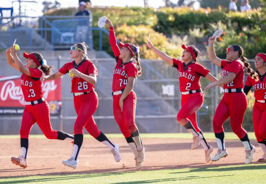 Whittier Christian players celebrate their 5-3 win over Mater Dei...
