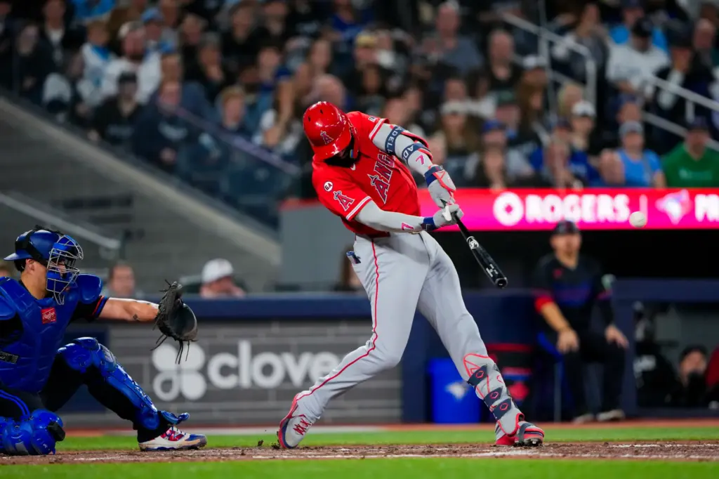 The Angels’ Jo Adell hits a double during the seventh...