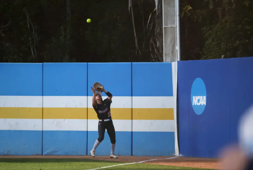 Cal State Fullertonâs Maggie Paulovich (33) gets underneath a fly-ball...