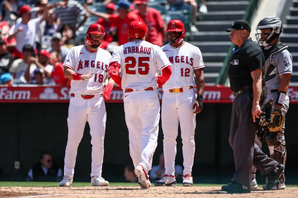 The Angels’ Travis D’Arnaud (25) celebrates his three-run home run...