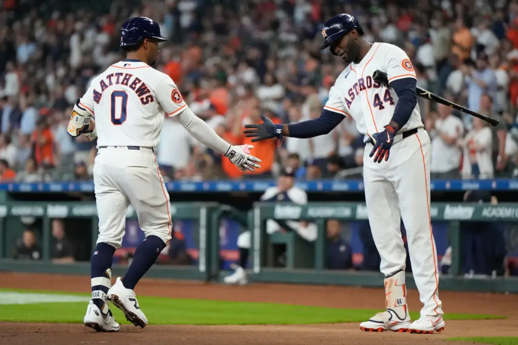 The Houston Astros’ Brice Matthews, left, celebrates with teammate Yordan...