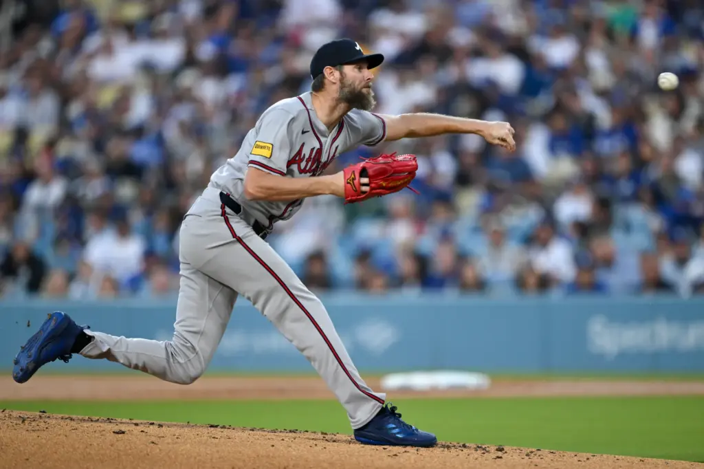 Atlanta Braves starting pitcher Chris Sale throws to the plate...