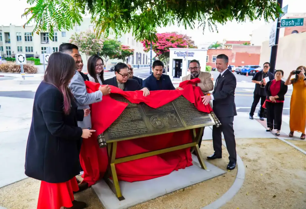 The Santa Ana City Council joins with Alan Woo, fourth...