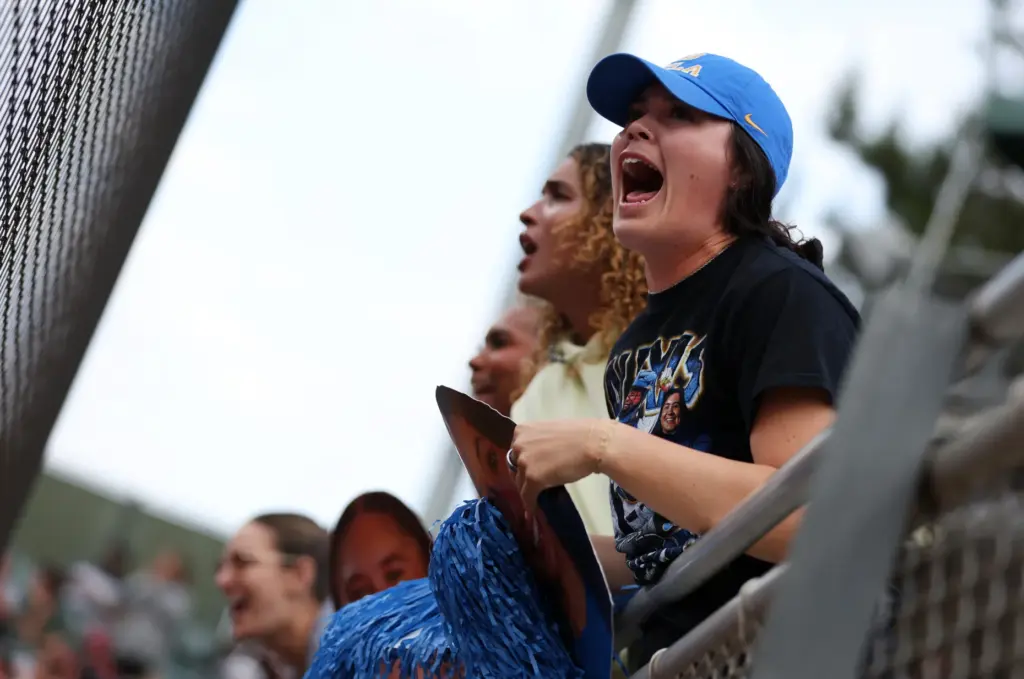 UCLA fans cheer on the Bruins as they take on...